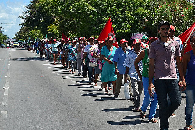 Landless workers march in protest for land reform in 2015