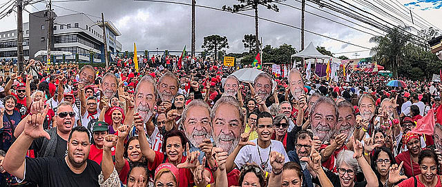 Over 10,000 people protested Sunday outside the Federal Police headquarters where Lula has been held for the last year