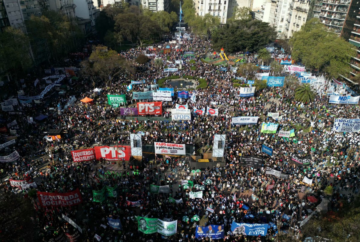 Aerial view of people attending a rally outside the National Congress against Argentina's President Javier Milei's vetoes in Buenos Aires on September 17, 2025. Thousands gather outside Argentine Congress to reject Milei's vetoes of laws seeking to remedy the financial straits of public universities and the country's largest pediatric hospital, which have been hit by the ultra-liberal leader's chainsaw.