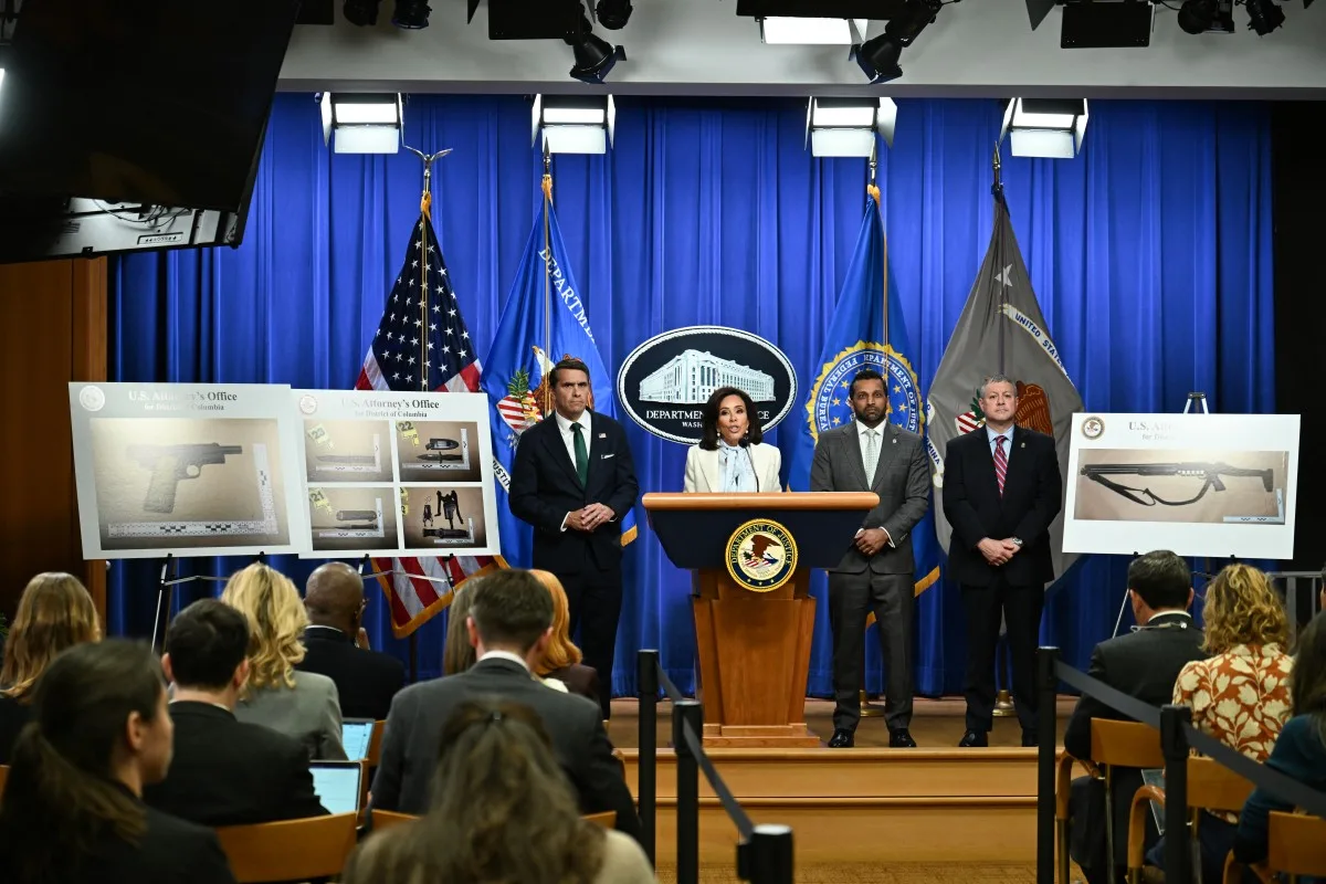 US Acting Attorney General Todd Blanche (L), FBI Director Kash Patel (2nd R), and US Attorney for the District of Columbia Jeanine Pirro (C) hold a news conference at Department of Justice headquarters in Washington, DC, on April 27, 2026. The man accused in the shooting at a media gala attended by Donald Trump was arraigned in court Monday on charges of trying to assassinate the president and two firearms crimes. Cole Allen, 31, faces a sentence of up to life in prison if convicted of attempting to kill Trump during the incident on Saturday at the White House Correspondents Association dinner in Washington. (Photo by ANNABELLE GORDON / AFP)