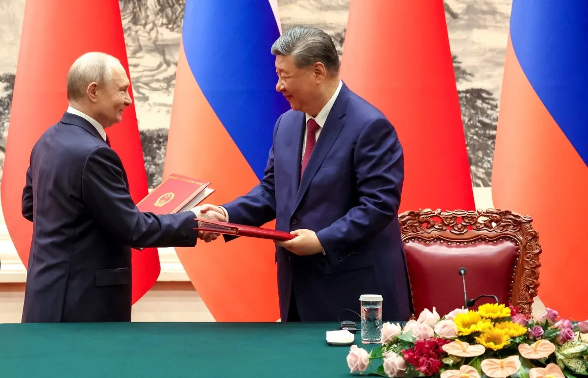 Presidente russo, Vladimir Putin, se reúne com seu homólogo chinês, Xi Jinping, em Pequim, em 20 de maio de 2026